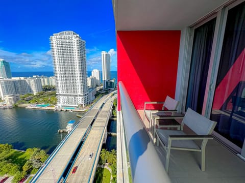 Charming private balcony with cozy seating — ideal for fresh air and morning views.
