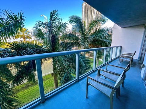 Stylish balcony with outdoor seating — ideal for sipping your morning coffee or unwinding at sunset.