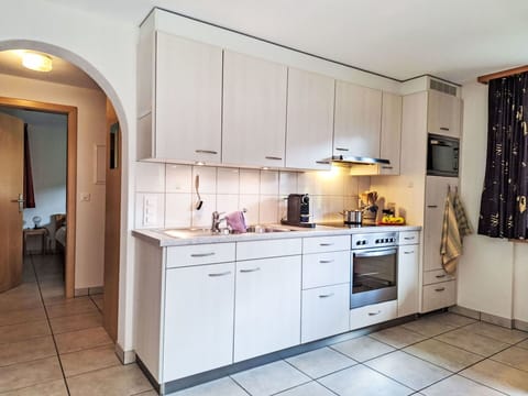 Kitchen, Kitchen Appliance, Countertop, Major Appliance, Interior Design, Cabinetry, Kitchen Sink, Sink, Plumbing Fixture, Flooring