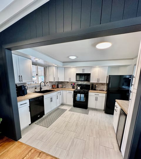 Kitchen area with wine fridge