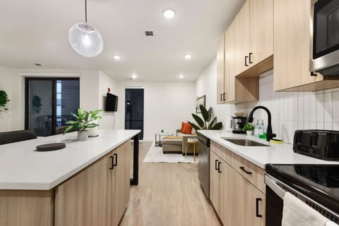 You’ll love the convenience of this fully equipped kitchen, where you can brew coffee, cook meals, or prepare snacks. The cozy layout and warm ambiance make cooking here a delightful part of your stay.