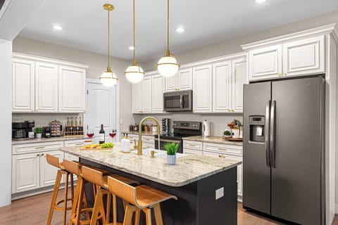 Cook up something amazing in the fully stocked gourmet kitchen with all you need