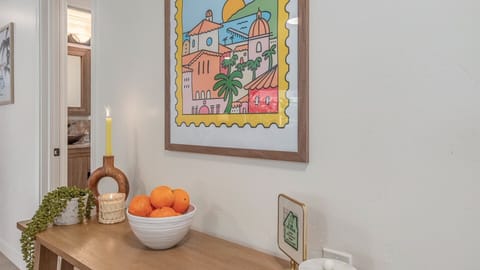 Entry table greats you with Wi-Fi info, candles and board games.