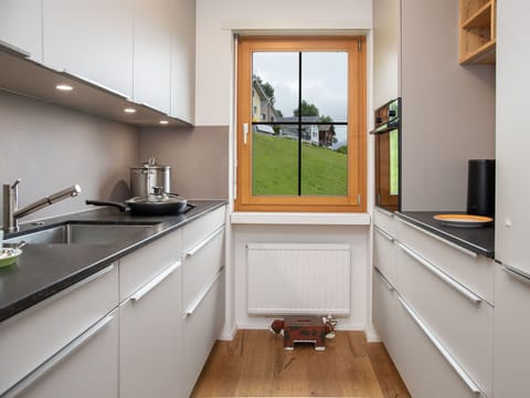 Kitchen, Kitchen Appliance, Countertop, Interior Design, Cabinetry, Flooring, Furniture, Major Appliance, Wood, Kitchen Sink