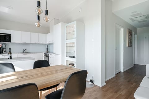 Enjoy a cup of coffee while chatting with your family or friends at the kitchen table.