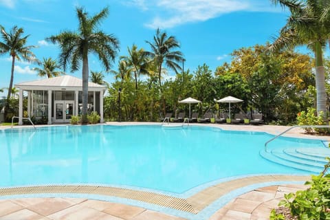 Dive into crystal-clear waters with easy, inviting step entry.