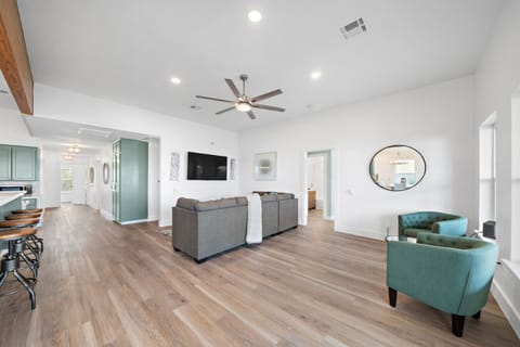 Curl up with a good book in the inviting living room