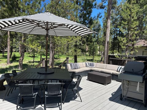Resort style back deck with luxury seating, amenities and BBQ.