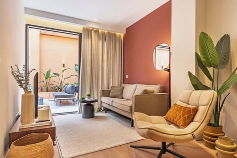 Stylish living room featuring premium, high-end furnishings for a comfortable stay.