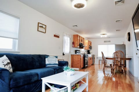 Open concept living room, dining area and kitchen