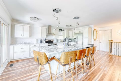 The epitome of contemporary design. Sleek lines, natural light, and a seamless flow create a culinary haven.