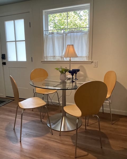 Dining for 4. Plates, utensils, glasses, mugs are available.