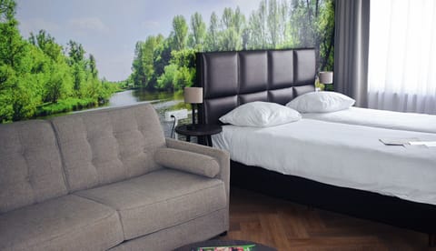 Unit with two Twin bed and a sofa bed