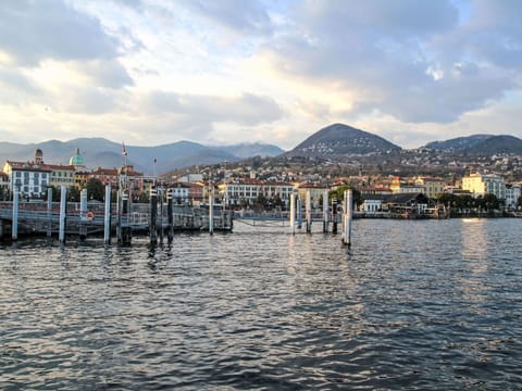 Blue, Water, Mountainous Landforms, Body Of Water, Mountain, Horizon, Waterway, Hill, Coastal And Oceanic Landforms, Channel
