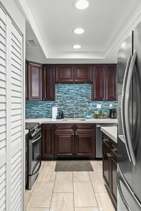 Cook with ease in the fully equipped kitchen featuring all the essentials for a comfortable stay.