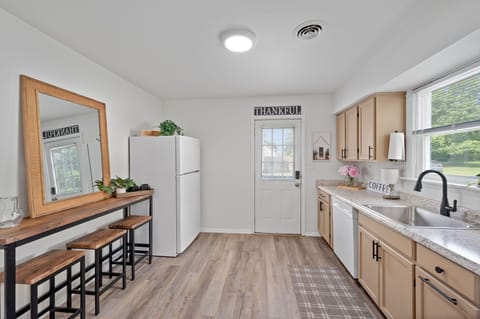 Kitchen with side entrance door