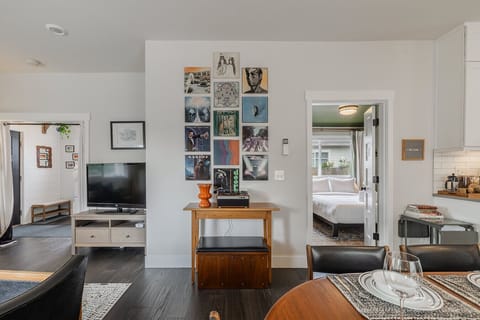 Chic Comfort – Enjoy your downtime with cushy seating, curated decor, and your favorite shows on the Smart TV.