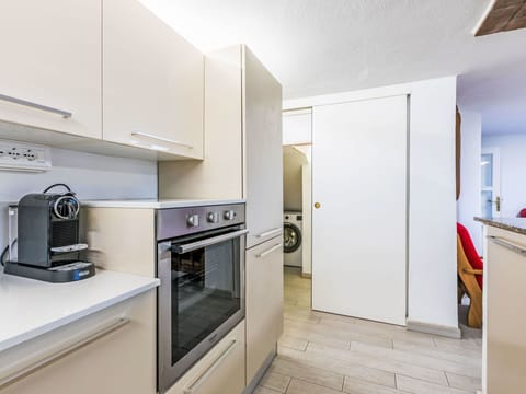 Flooring, Major Appliance, Kitchen Appliance, Kitchen, Interior Design, Countertop, Floor, Cabinetry, Furniture, Room