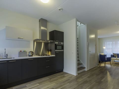 Flooring, Floor, Interior Design, Countertop, Wood, Ceiling, Furniture, Cabinetry, Kitchen, Room