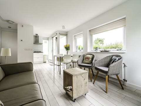 Furniture, Interior Design, Couch, Flooring, Wall, Living Room, Wood, Floor, Ceiling, Room