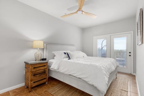 Bright room with peaceful balcony vibes.