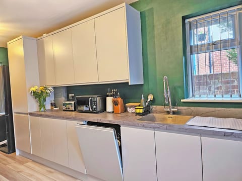 Kitchen, dishwasher, fridge, microwave, toaster