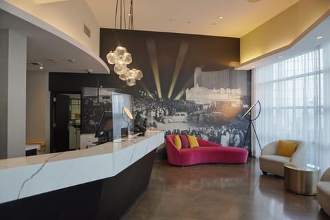 Arrive in style to a chic lobby with bold design.