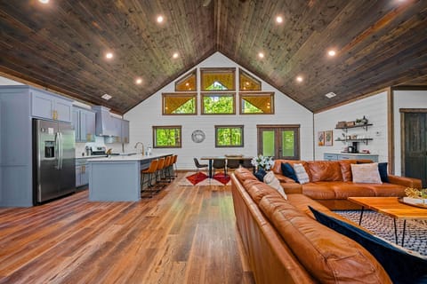 Soaring ceilings, cozy fireplace, and forest views — your group’s favorite gathering spot.