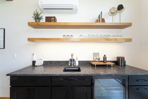 Wet bar behind the living room couch | Main Level