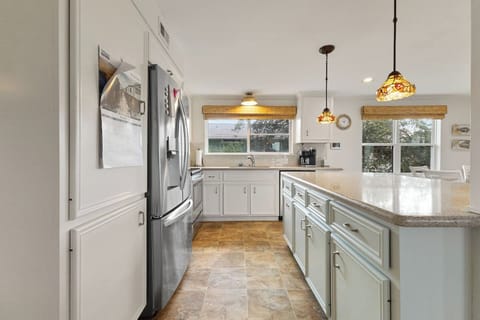 Gather around the island while visiting with the chef!