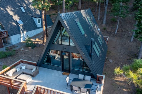An iconic modern A-Frame with a commanding view of the Lake.