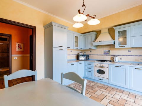 Interior Design, Flooring, Kitchen, Wood, Cabinetry, Furniture, Ceiling, Floor, Countertop, Room