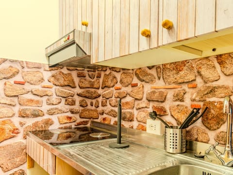 Stone Wall, Plumbing Fixture, Kitchen, Countertop, Plumbing, Wood Stain, Brick, Tap, Tile, Design