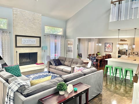 Huge living area with plenty of comfy seating - look at those vaulted ceilings! 