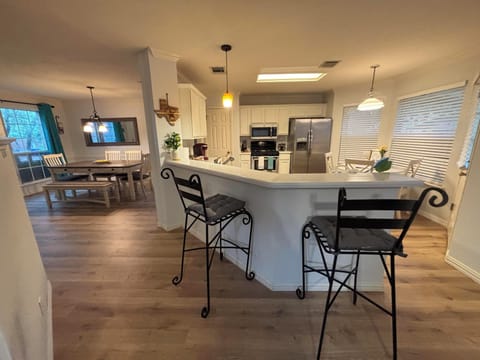 Sit up to the bar in this kitchen and maybe score a sample from the chef