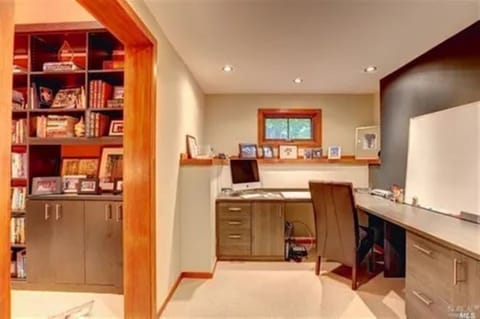 Office with Pull out sofa in attached library