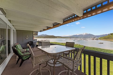 The primary bedroom features a king sized bed, en suite bathroom with private laundry, and private access to the balcony.