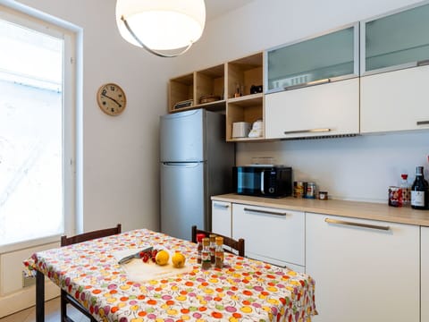 Furniture, Kitchen, Interior Design, Kitchen Appliance, Countertop, Major Appliance, Flooring, Wood, Room, Cabinetry