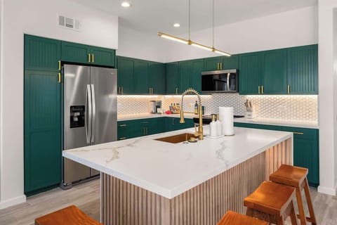 Fully equipped kitchen with a modern design and a spacious island