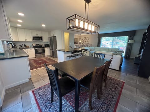 The leather covered dining table area fit for 6 people.