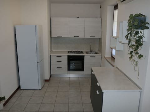 Kitchen, Kitchen Appliance, Countertop, Flooring, Major Appliance, Cabinetry, Wood, Furniture, Floor, Interior Design