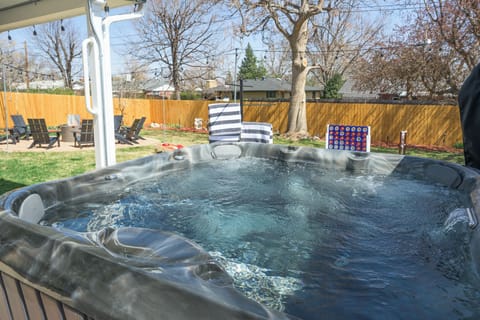 Soak under the stars in the bubbling hot tub, just steps from a cozy fire pit gathering space.