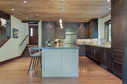 The chic, open kitchen offers ample space & every home comfort