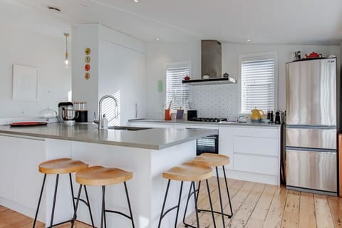 There is breakfast bar seating which is handy for casual dining.