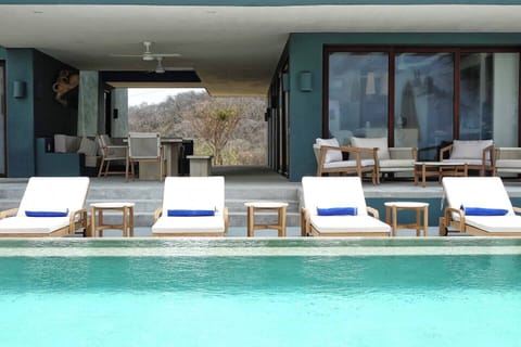 Pool, kitchen and outside dining area
