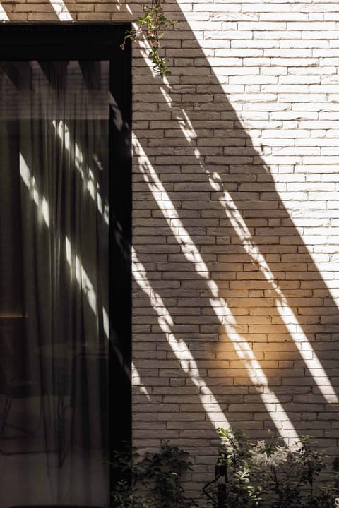 Architectural exterior with wood and brick pattern