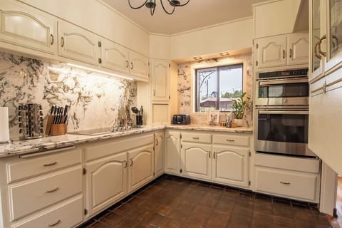 Enjoy a home cooked meal in the gourmet kitchen.