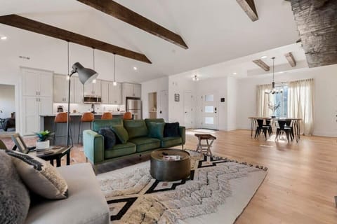 A view of the open living, dining and kitchen space.