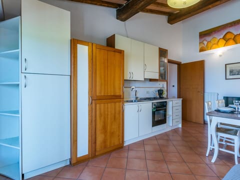 Wood, Flooring, Interior Design, Furniture, Floor, Kitchen, Ceiling, Room, Kitchen Appliance, Countertop