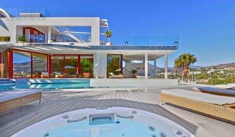 Jacuzzi and sun loungers.